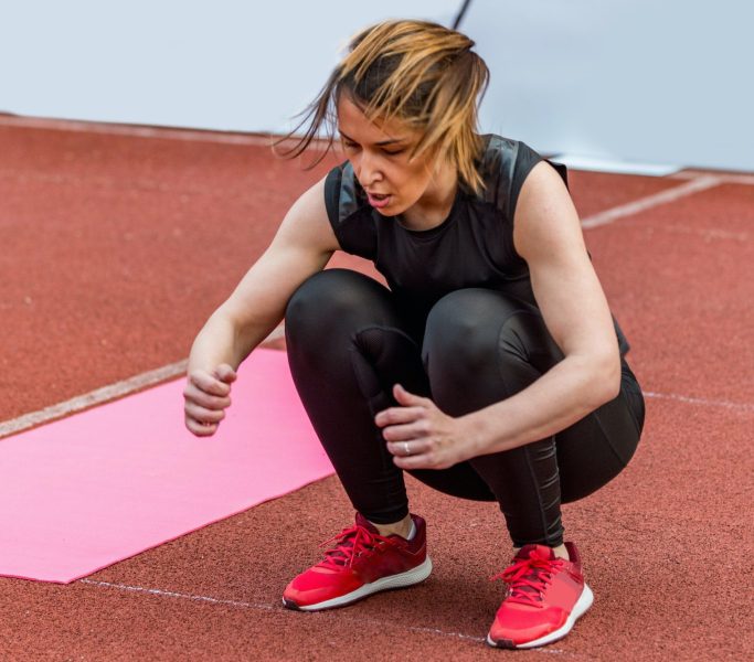 Young woman on competition outdoors